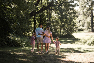 Her boys fill her life with joy. Cropped shot of a young family spending time together outdoors.