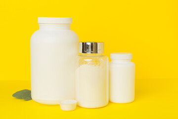 Jar with protein powder on color background. Sports nutrition concept