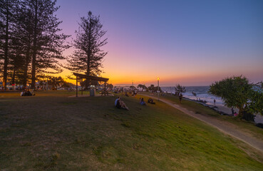 unset beach views across Main Beach in Byron Bay, New South Wales, Eastern Australia