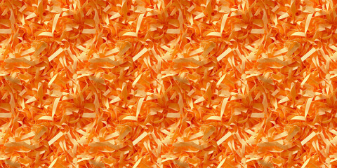Fototapeta premium shredded paper filler in bright orange color with thin, delicate strips, shredded paper filler texture background