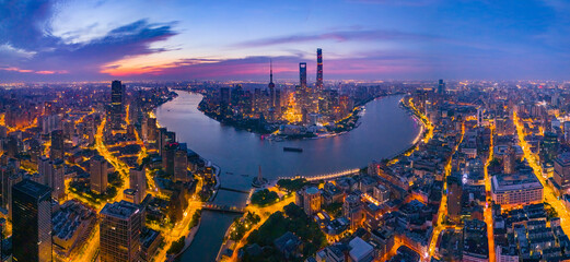 Fototapeta premium Aerial view of modern city skyline and buildings at sunrise in Shanghai