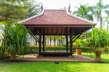 beautiful wooden gazebo in real tropical nature