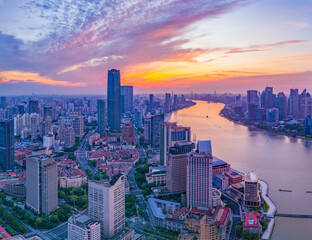 Fototapeta premium Aerial view of modern city skyline and buildings at sunrise in Shanghai