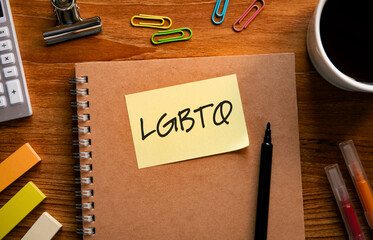 There is sticky note with the word LGBTQ. It is an abbreviation for Lesbian, Gay, Bisexual,...