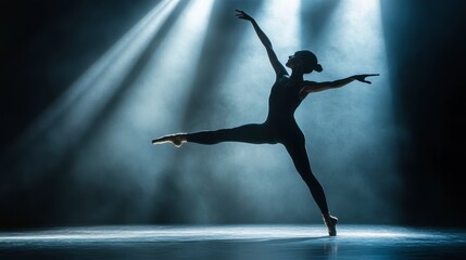 Fototapeta premium A professional dancer performing a solo ballet routine, with her movements beautifully captured under stage lights.