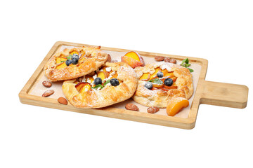 PNG, Fruit galettes on wooden kitchen board, isolated on white background