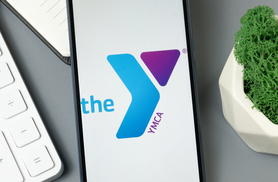 New York, USA - 30 August 2024: YMCA Logo on Phone Screen, Company Icon on Display