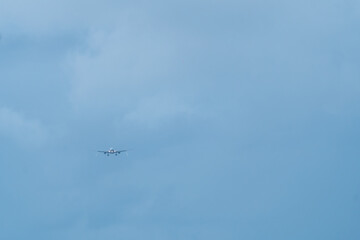 plane taking off from the runway in winter in bad weather
