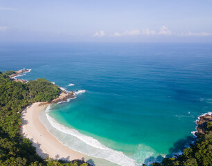 Tropical beach sea Beautiful island beach sea in good weather day Aerial view shot on drone camera