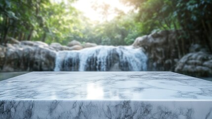 A marble surface in focus with a blurred waterfall and lush greenery in the background.