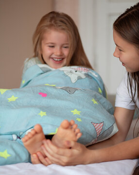 Tickled feet. Image with selective focus 