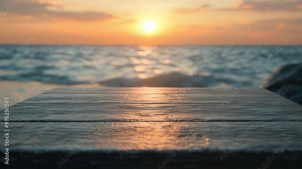 Canvas Prints Sunset over the ocean with a reflective surface in the foreground.