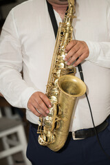 Fototapeta premium Man plays the saxophone ,