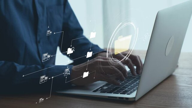 Business person managing online documents folders for efficient work processes. Ensure secure and quick access to all your important online documents with ease. UUID