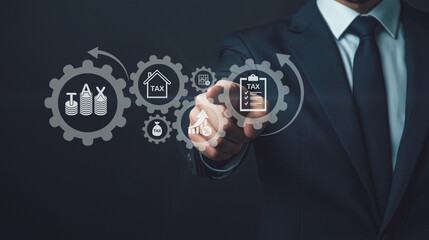 A businessman manipulates a virtual interface with icons representing various tax-related functions, symbolizing the integration of advanced technology in tax management and compliance.