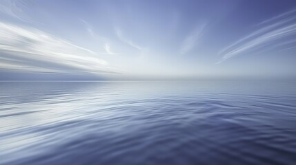 Obraz premium Abstract Blue Blurred Background with Light Sky Blue Color Gradient, Soft Clouds, and Calm Sea Water Texture. Bright Summer Day, Clear Sky, and Minimalistic Vector Illustration in a Realistic Photo