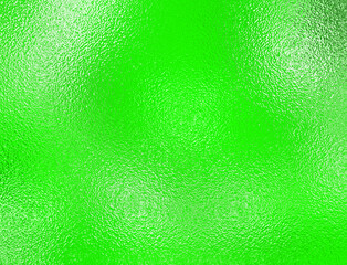 Soft green foil glass texture background. Abstract gradient bright light reflection and shiny rough texture surface. Glass effect background
