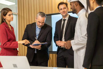 Group of business meeting and discussing strategy with startup project analysis finance,management.Success business people plan and brainstorm,marketing,idea,research,organization in office.Teamwork