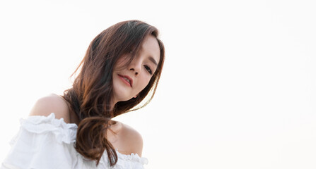 Fototapeta premium Portrait of smiling beautiful pretty asian woman clean fresh healthy white skin posing smile in pajamas white clothes, skincare, lady, model, cosmetic, fashion.Girl relax, enjoy at home.asia beauty