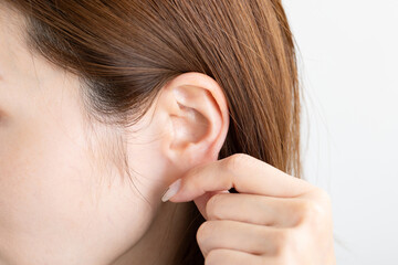 Fototapeta premium 女性の耳 Woman's ear