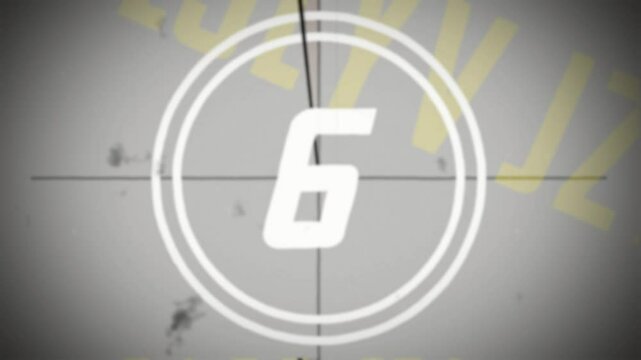 Old movie film countdown. Vintage defocus film look, flicker, grain, scratch effect. Yellow text on background. 
