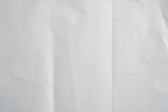 White paper folded in thirds