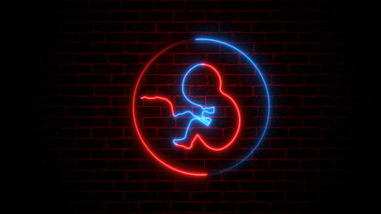 Neon, glowing human embryo. Human Cloning. Human fetus baby concept on brick wall.