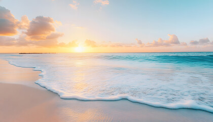 Obraz premium Crystal-clear turquoise waters with gentle waves lapping at a pristine beach under a golden sunset