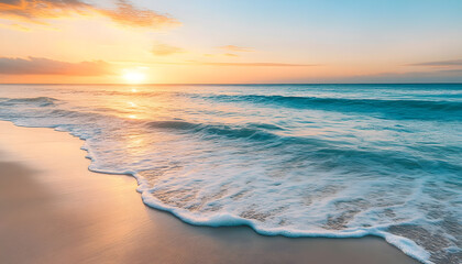 Obraz premium Crystal-clear turquoise waters with gentle waves lapping at a pristine beach under a golden sunset