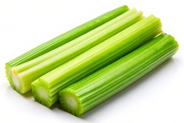 The camera zooms in on a solitary celery rib, its translucent texture glistening against the pure white backdrop as it seems to glow with an inner light.
