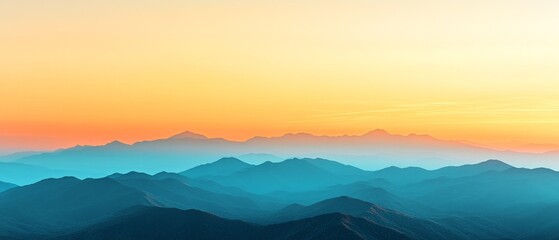 Breathtaking sunrise over layered mountain ranges seen from a high vantage point in the early hours of a clear morning