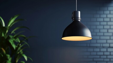 Obraz premium A modern black pendant lamp illuminates a cozy room with dark walls and greenery, enhancing the ambiance of contemporary design.