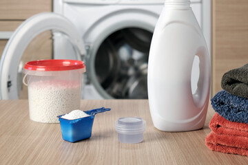 Close-up a liquid washing gel and white washing powder for of a washing machine.