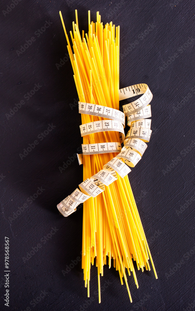 Poster string spaghetti on black background