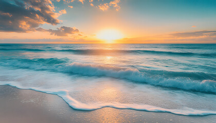 Fototapeta premium Crystal-clear turquoise waters with gentle waves lapping at a pristine beach under a golden sunset
