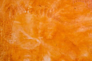 Textured wall brushed painted Background, Abstract Orange Oil Color.