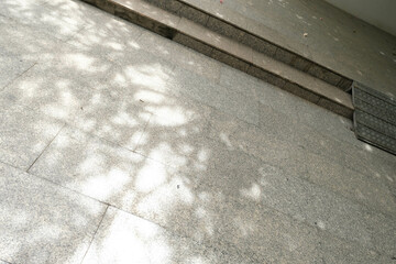 Sunlight shadow on the tile.