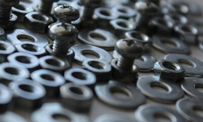 Thread Nuts, Fixing Washers And Screw Bolts Isolated On White Macro Shot Stock Photo

