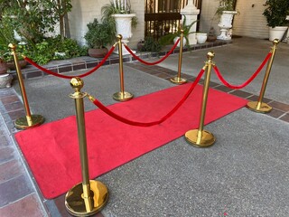 Red Carpet Entrance with Velvet Ropes and Gold Stanchions

