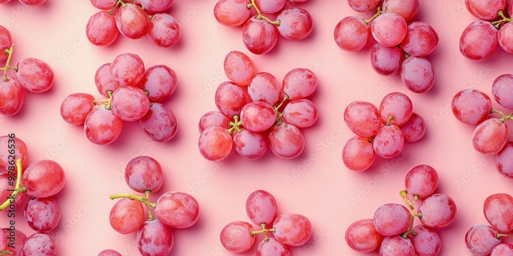 Poster Fresh pink grapes scattered on a soft pink background. The vibrant color adds a playful touch. Perfect for food blogs, health articles, or design projects. AI