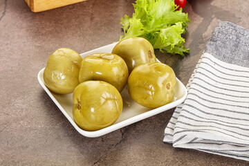 Homemade pickled green tomato appetizer
