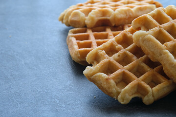 Belgian waffles on a dark background