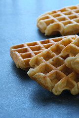 Belgian waffles on a dark background