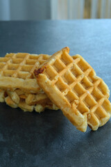Belgian waffles on a dark background
