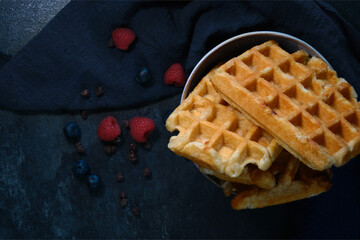 Belgian waffles on a dark background