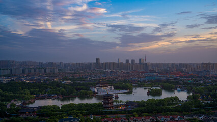 Night view and stunning sunset of Datang Furong Garden City Park, Xi'an, China