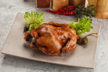Baked small chicken with spices