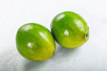 Two ripe green exotic avocado fruit