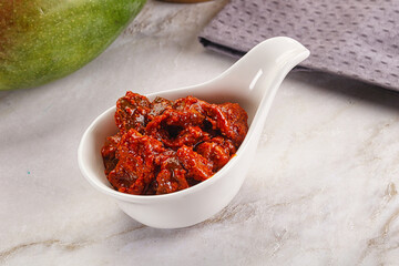 Spicy pickled raw green mango