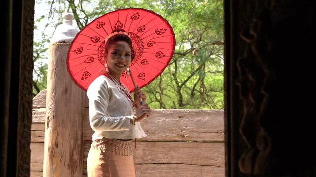 Myanmar Woman in traditional Myanmar suit enjoy travel in Myanmar 